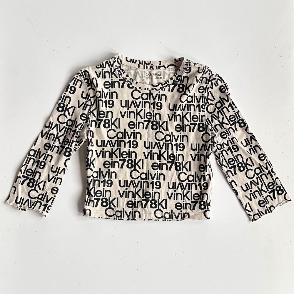 Calvin Klein Allover Logo Long Sleeve Tee – Size XS (Youth) (girls 8/9)
